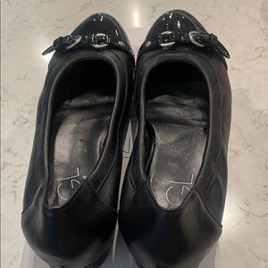 AGL Black Patent Leather Flats with Buckle Detail